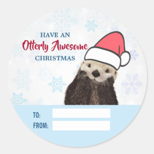 Cute Otter Wearing a Santa Hat jul Runt Klistermärke
