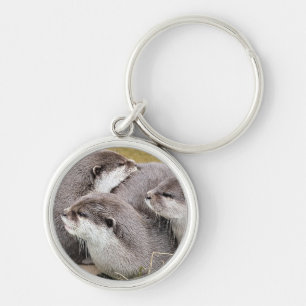 CUTE OTTERS RUND SILVERFÄRGAD NYCKELRING