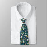 Cute pelicans, färgade tropiska blommor mönster slips<br><div class="desc">Cute pelicans med färgade tropiska blommor i ett sömlöst mönster med blå bakgrund. Perfekt för ett strandhem.</div>