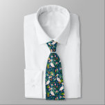 Cute pelicans, färgade tropiska blommor mönster slips<br><div class="desc">Cute pelicans med färgade tropiska blommor i ett sömlöst mönster med blå bakgrund. Perfekt för ett strandhem.</div>