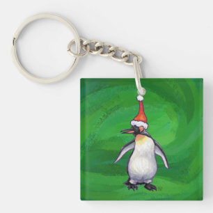 Cute Penguin i Santa Hat på Grönt