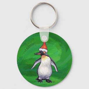 Cute Penguin i Santa Hat på Grönt Nyckelring