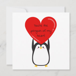 Cute penguin som håller ett stort rött hjärta - fy julkort