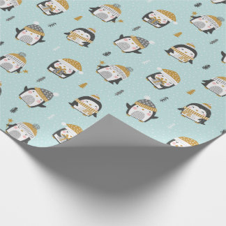 Cute Penguins med liten träd på ljusblå Presentpapper