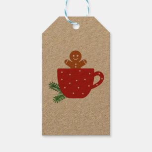 Cute pepparkaksgubbe i ett rödkaffe kopp presentetikett
