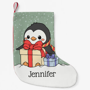 Cute Pingguin med julklappar i snöfallet Liten Julstrumpa