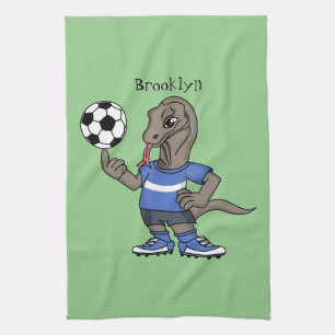 Cute roligt Komodo draon spelar fotboll tecknad Kökshandduk
