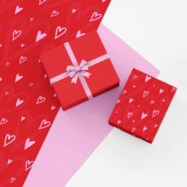 Cute Rosa-hjärtan på röd bakgrund Presentpapper