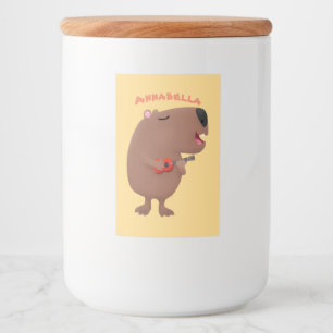 Cute singing capybara ukulele tecknad illustration mat etikett