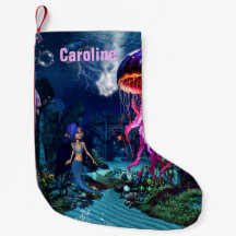 Cute sjöjungfru tittar på vackra maneter