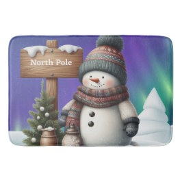 Cute snögubbe på Nordpolen med norra ljus Badrumsmatta
