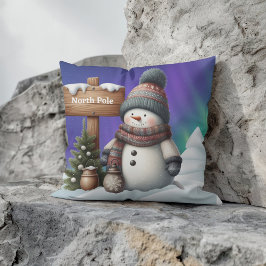 Cute snögubbe på Nordpolen med norra ljus Kudde