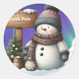 Cute snögubbe på Nordpolen med norra ljus Runt Klistermärke