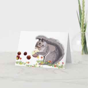 Cute Squirrel äter ett äpple Helgkort