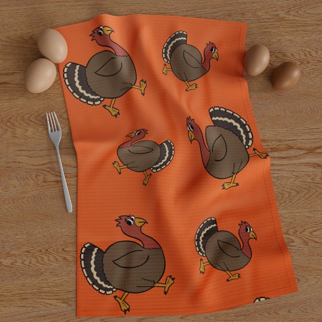 Cute Thanksgiving Turkey Orange Kitchen Towel Kökshandduk (A fun thanksgiving turkey trotting along on this orange kitchen towel with his pals)