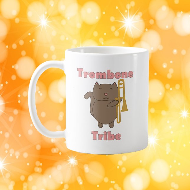 Cute Trombone Cat Illustration Trombone Tribe  Kaffemugg (A mug with a brown cat and a trombone along with the words trombone tribe)