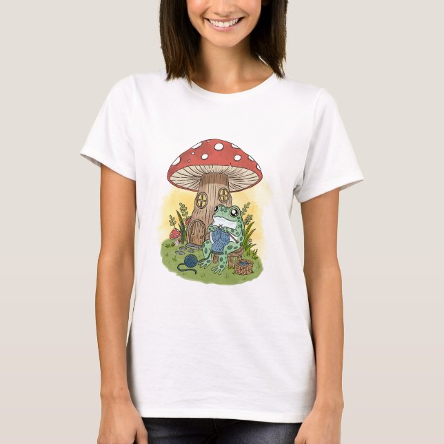 Cute Whimsical Frog Knitting Illustration T Shirt (Framsida)