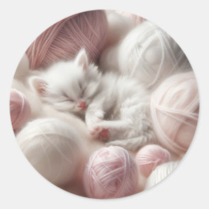 Cute White Kitten Napping in Yarn Runt Klistermärke
