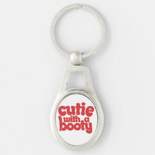 Cutie med BOOTY Ovalt Silverfärgad Nyckelring