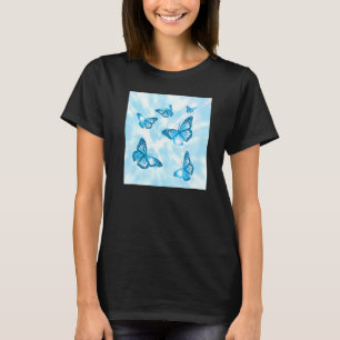 Cyanasetisk pastellfjäril och blåfärgningsfärg t shirt