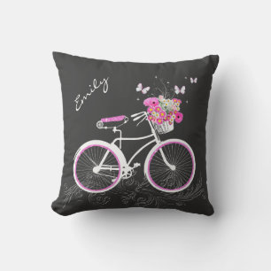 Cykel med dekorativ kudde för