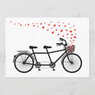Cykel med inbjudan och rött hjärta