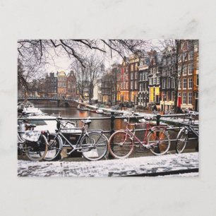 Cyklar i snön i Amsterdam Vykort