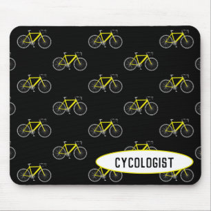 cykolog gult cykel på svart musmatta