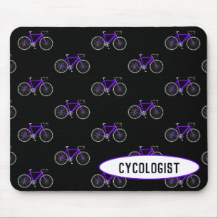 cykolog lila-cykel på svart musmatta