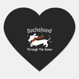 Dachshund genom den Snö fuktiga julsötaren Hjärtformat Klistermärke