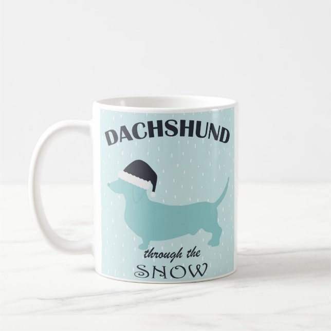 Dachshund genom den vackra julen i Snö Kaffemugg (Vänster)