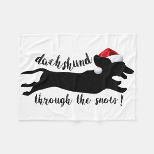 Dachshund genom Helgdagarna vid jul i snö Fleecefilt