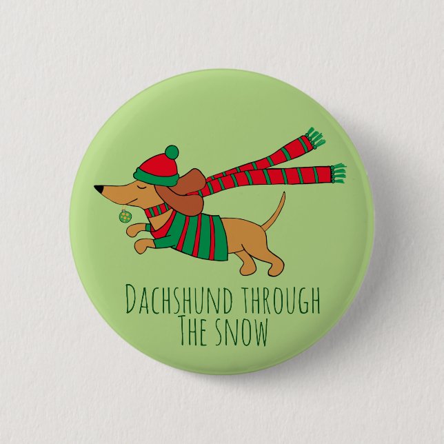 Dachshund genom snö julknapp knapp (Framsida)