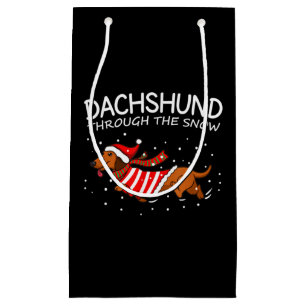 Dachshund genom Snö Rolig hund jul