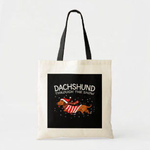 Dachshund genom Snö Rolig hund jul Tygkasse