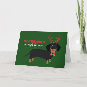 Dachshund genom snö Söt Doxie Renhund Helgkort
