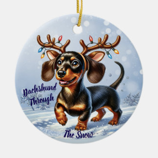 Dachshund genom snön  julgransprydnad keramik