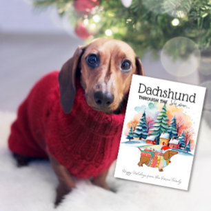 Dachshund genom snön julkort kort