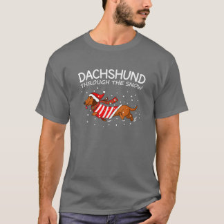 Dachshund genom snön Rolig hund jul tjej T Shirt