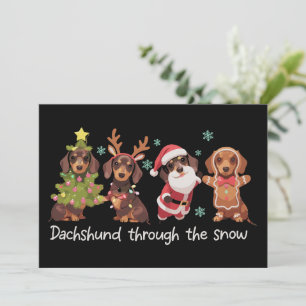 Dachshund genom snön Roliga julhundar Julkort
