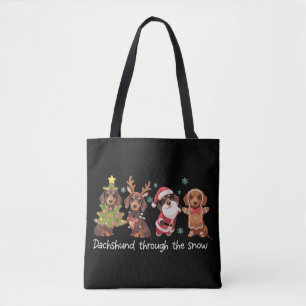 Dachshund genom snön roliga julhundar tygkasse