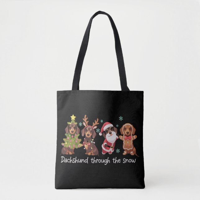 Dachshund genom snön roliga julhundar tygkasse (Framsida)