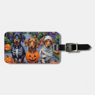 Dachshund hundar trick-or-treating på Halloween Bagagebricka