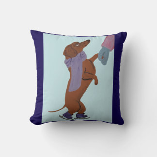 Dachshund konståkar med sin mamma kudde