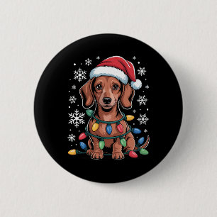 Dachshund med tomten insvälld i julklapp knapp