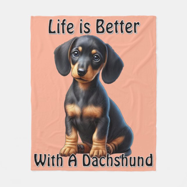 Dachshund Puppy Sitta och Tittar med ocent Fleecefilt (Framsidan)