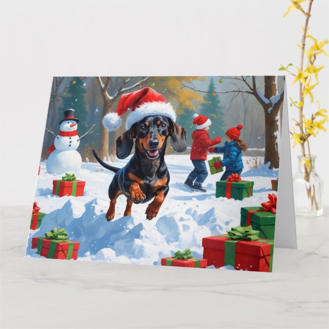 Dachshund springer i snö med julhatt kort (Gul blomma)