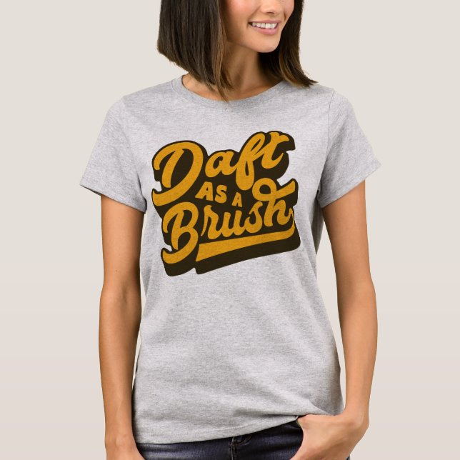 Daft as A Brush Yorkshire English Idiom Tee Shirt (Framsida)
