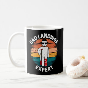 Dålig landningsexpert brutet ben ben skada återhäm kaffemugg