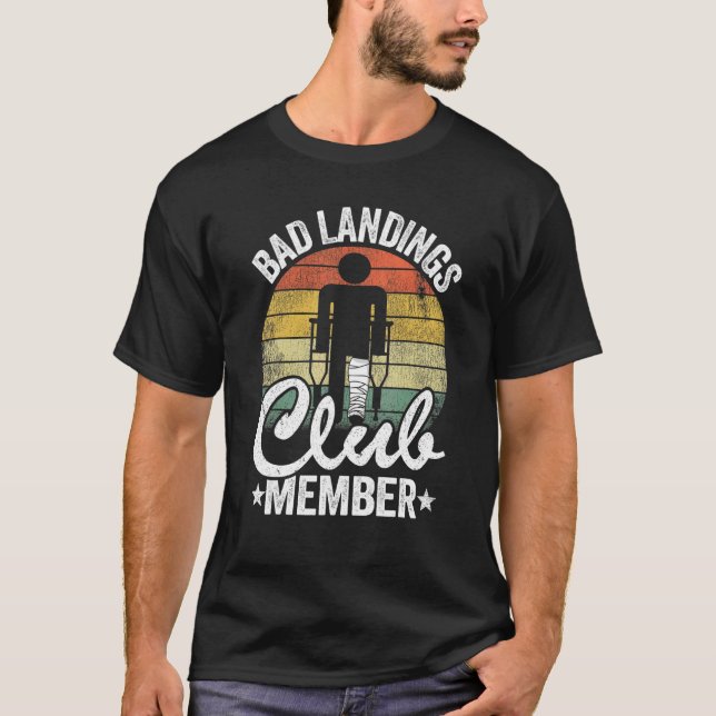 Dålig landningsmedlem Klubb medlem får välmenande  T Shirt (Framsida)